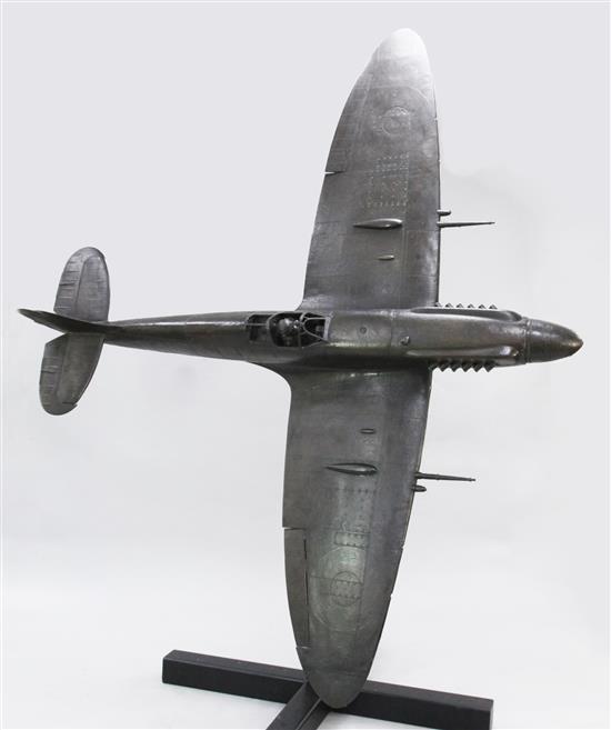 Stephen Allen. A limited edition bronze 1/5th scale model of a Mark XIVc spitfire with a wrought iron stand.